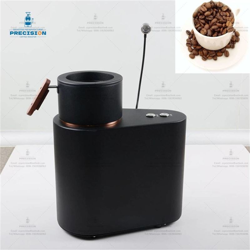 Tornatore di caffè compatto con una capacità di 200 g, potenza di fuoco di 1900 kcal e tazza di raffreddamento in oro rosa.